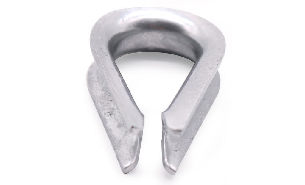 Guy thimbles support guy wires for tall structures during oil drilling