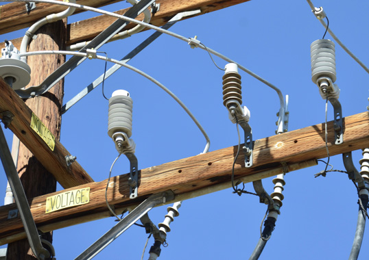 Distribution arresters divert surge energy into the ground