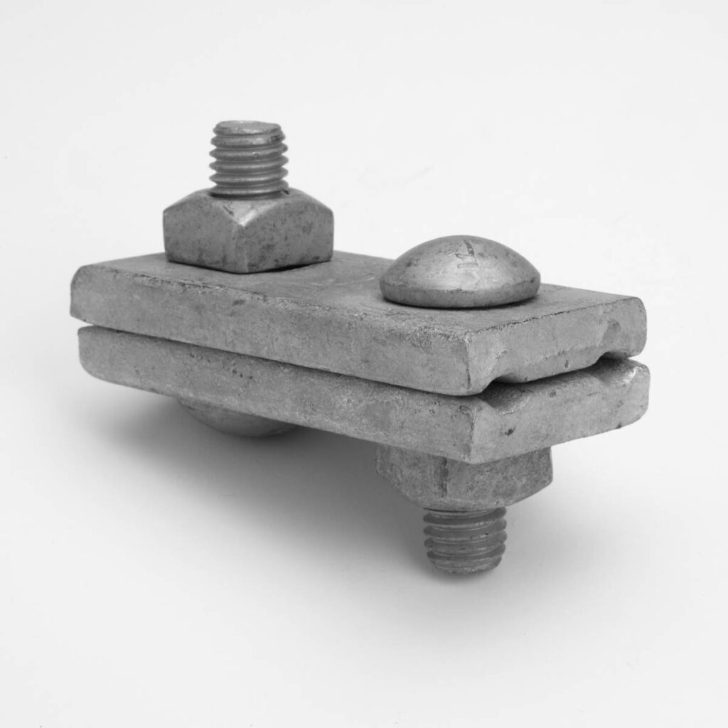 Guy clamps secure guy wires and maintain mechanical balance